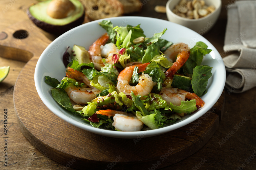 Healthy green salad with shrimps and avocado Healthy green salad with shrimps and avocado