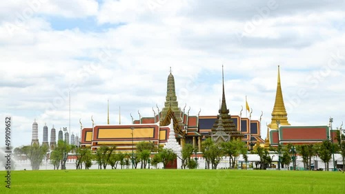 4k Cloudy Sky Timelapse Wat Phra Kaew Temple of the Emerald Buddha, grand palace the most famous tourist spot and must visit Temple in Bangkok, Thailand.