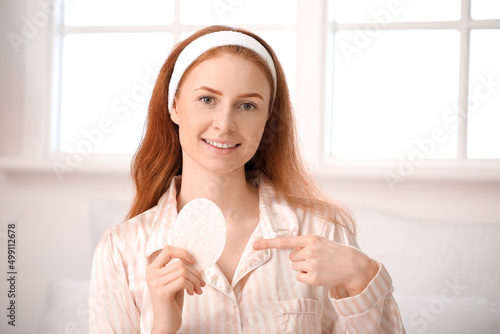Young woman with makeup spo...