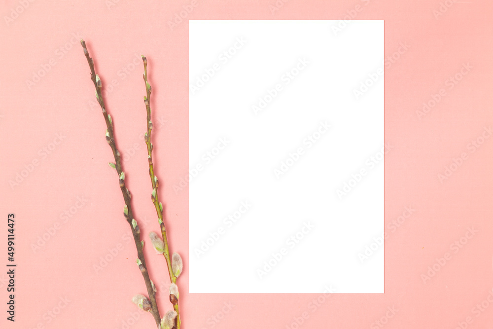 Wedding invitation or greeting card mockup with tree branches on a pink background. Wedding invitation or greeting card mockup with tree branches on a pink background.