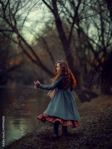 Girl walking in the spring park