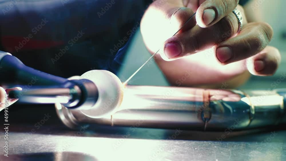 Man welding stainless pipe. Argon gas. Welder's hands are working. Man welding stainless pipe. Argon gas. Welder's hands are working.