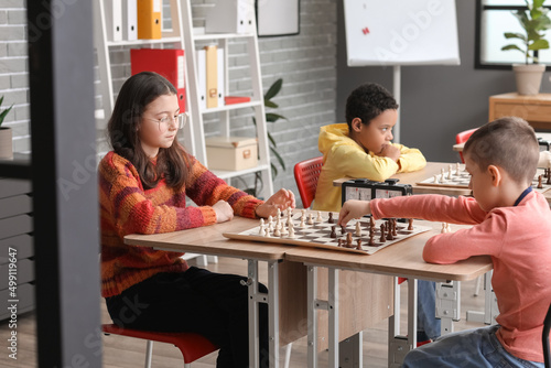 Little children playing che...