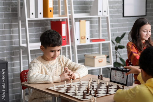 Little children playing che...