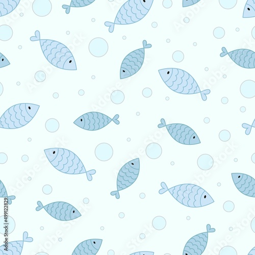 Seamless pattern of blue and light blue fish and bubbles. On a light blue background. 