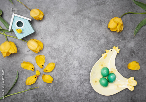 Easter layout, a plate of chicken and yellow chicks, by green eggs ,tulips