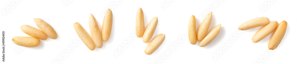 Shelled European pine nuts isolated on white background, top view. Shelled European pine nuts isolated on white background, top view.