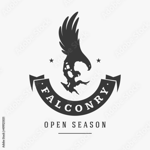 Falconry with silhouette attacking hawk vector logo. Majestic black bird prepared for hunting small animals. Stem peregrine falcon reliable assistant for hunter tracking down and catching prey.