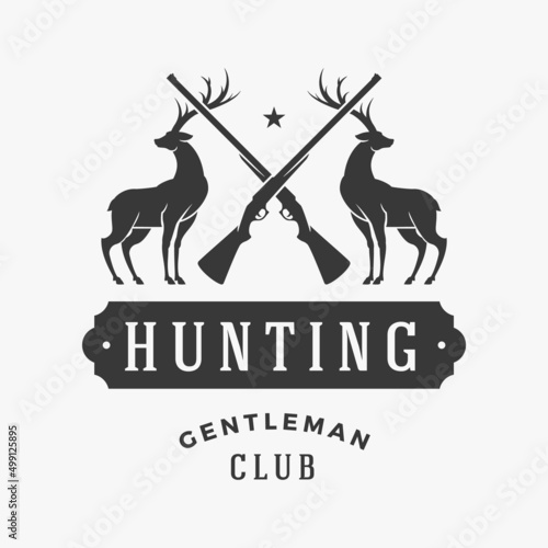 Gentlemens hunting club vector logo. Silhouettes proud deer with crossed guns symbol of gambling and elite monochrome prey. Fueled animal tracking for adrenaline valuable trophies.