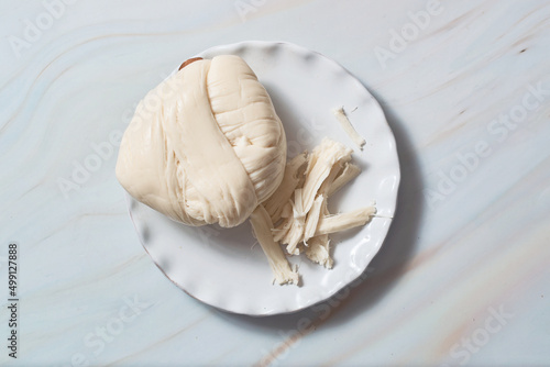 Cheese for quesadillas, called oaxaca cheese or quesillo from Mexico.