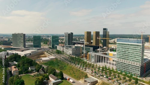 Aerial view of European Parliament administrative office in Luxembourg City, Capital of EU. Urban Skyline of Downtown. Politics, Economy and Global Communications. 4K drone panoramic establishing shot