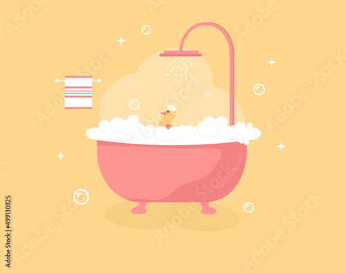 Bathtub with foam bubbles inside and bath yellow rubber duck.