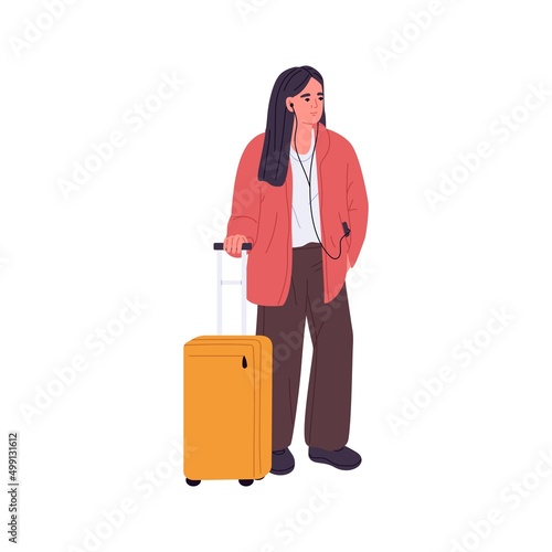 Woman tourist standing with wheel suitcase, luggage. Traveler with baggage waiting for smth and listening to music in earphones. Female passenger. Flat vector illustration isolated on white background