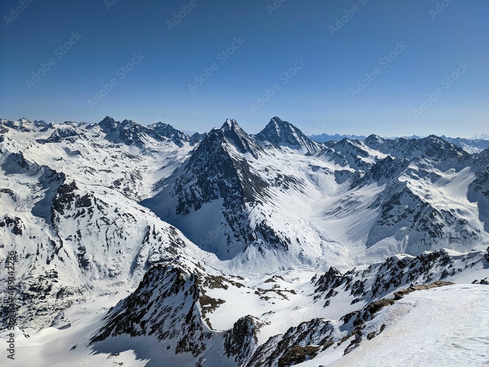Beautiful view of the Swiss mountains from the Pischahorn above Davos Klosters in the canton of Graubunden. Ski touring in Switzerland Beautiful view of the Swiss mountains from the Pischahorn above Davos Klosters in the canton of Graubunden. Ski touring in Switzerland