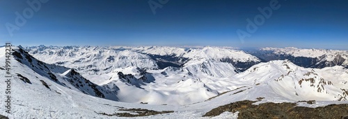 Mountain panorama on the Pischahorn above Davos Klosters Mountains. Beautiful mountain landscape with snowy mountain peaks