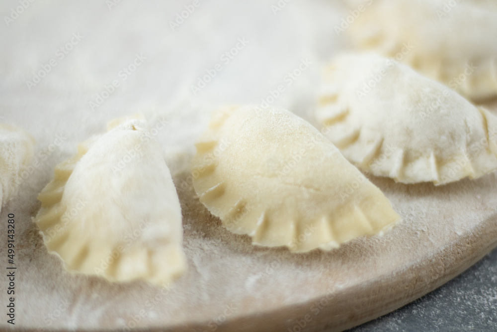 dumplings on a wooden board dumplings on a wooden board