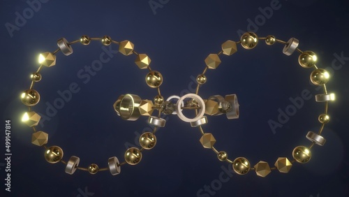 Anelli con sfere e cubetti legati da un filo materiali in oro ed argento photo
