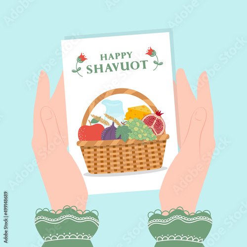 Happy Shavuot. Basket with fruits, milk and cheese. Jewish holiday shavuot greeting card.
