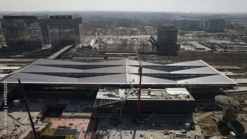 Aerial establishing shot of the construction site of the Warsaw West railway station during refugee crisis due to the Russian invasion of Ukraine Aerial establishing shot of the construction site of the Warsaw West railway station during refugee crisis due to the Russian invasion of Ukraine