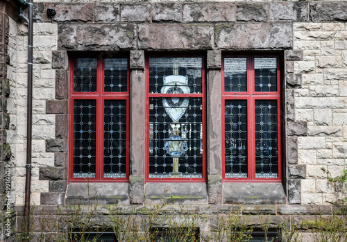 Fototapeta Naklejka Na Ścianę i Meble -  Old historic window in vintage urban building