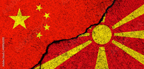 China and Macedonia. Flags background. Concept of politics, economy, culture and conflicts, war. Friendships and cooperation. Painted on concrete walls banner photo