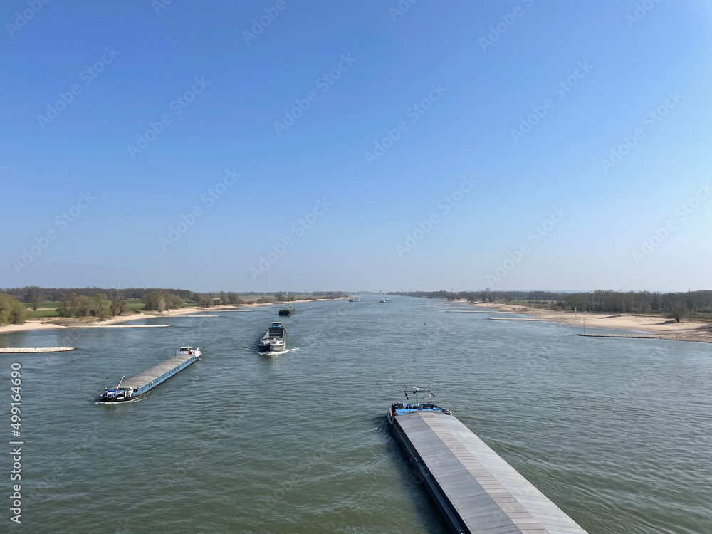 Cargo ships on river Waal