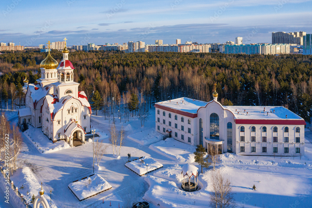Obraz premium Surgut city in winter. Church of St. George the Great Martyr. Aerial view.