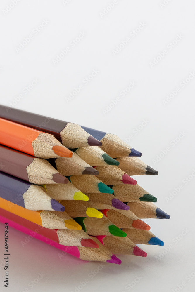 close up of colour pencils background. Color pencils on white background horizontal close up of colour pencils background. Color pencils on white background horizontal