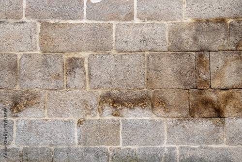 stone wall of granite ashlars texture