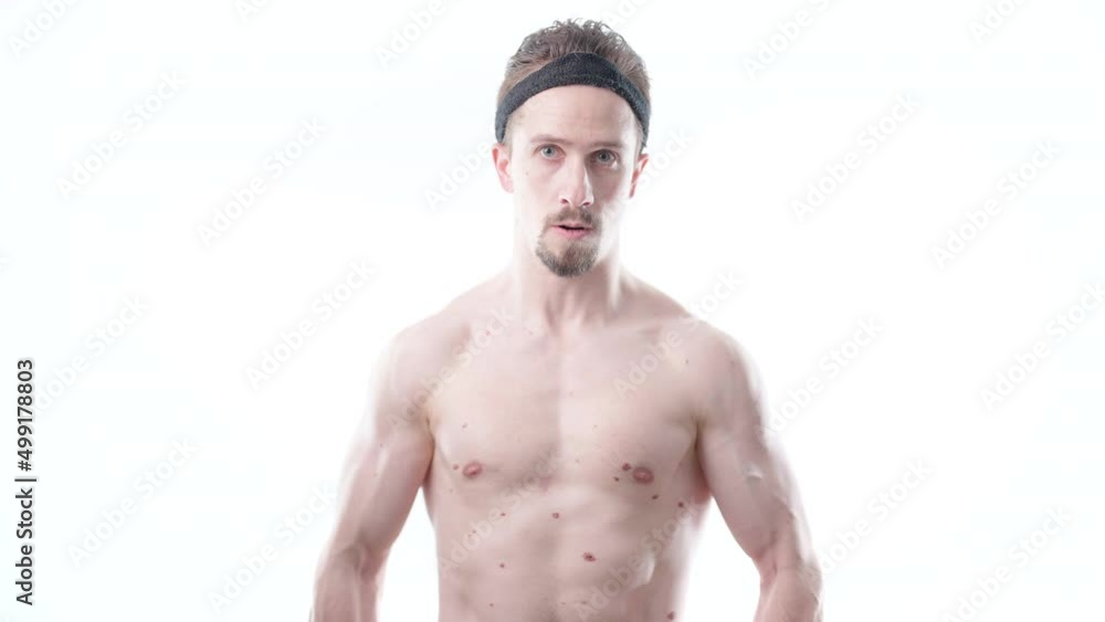 Shirtless man on white background doing dumbbell bicep curl exercise 4K Shirtless man on white background doing dumbbell bicep curl exercise 4K