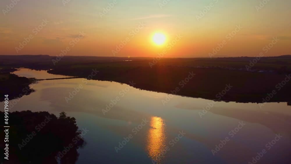 Sunset, beautiful sunset flight on a dam in Brazil, drone scene. Sunset, beautiful sunset flight on a dam in Brazil, drone scene.