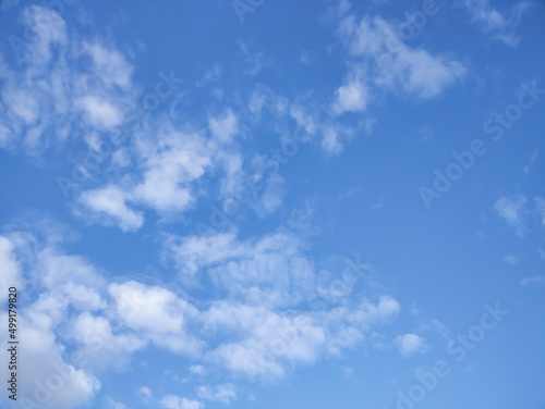 Fluffy cloud texture from a perfect cloudy blue sky