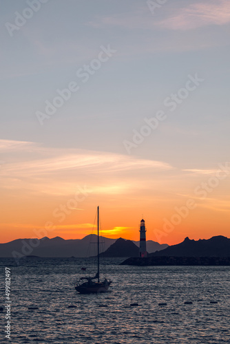 Turgutreis lighthouse at sunset in bodrum Turkey
