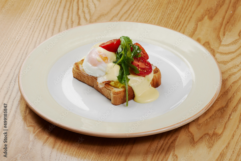 delicious breakfast sandwich with ham and salmon, cheese, egg, vegetables delicious breakfast sandwich with ham and salmon, cheese, egg, vegetables