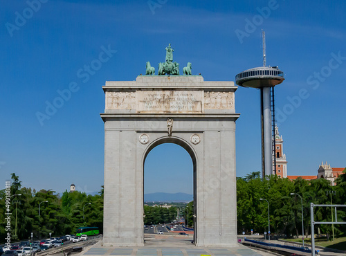 victory arch and moncloa lighthouse photo