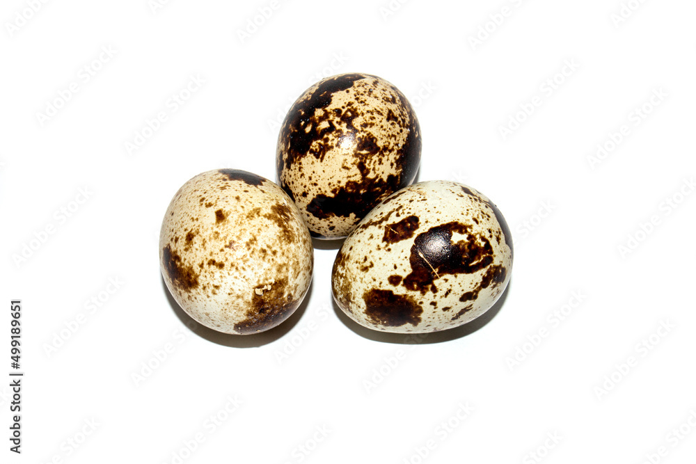Quail eggs on a white background.Quail eggs background.Homemade quail egg.