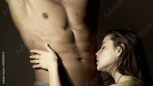 Romantic and love. Sexy young couple in love. Sexy woman kissed men bare naked torso. Enjoying tenderness. Young lovers.