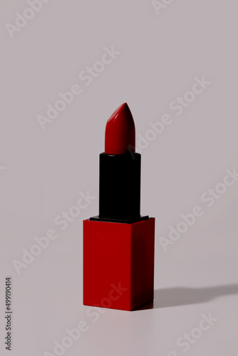 red lipstick, white background. Cosmetics