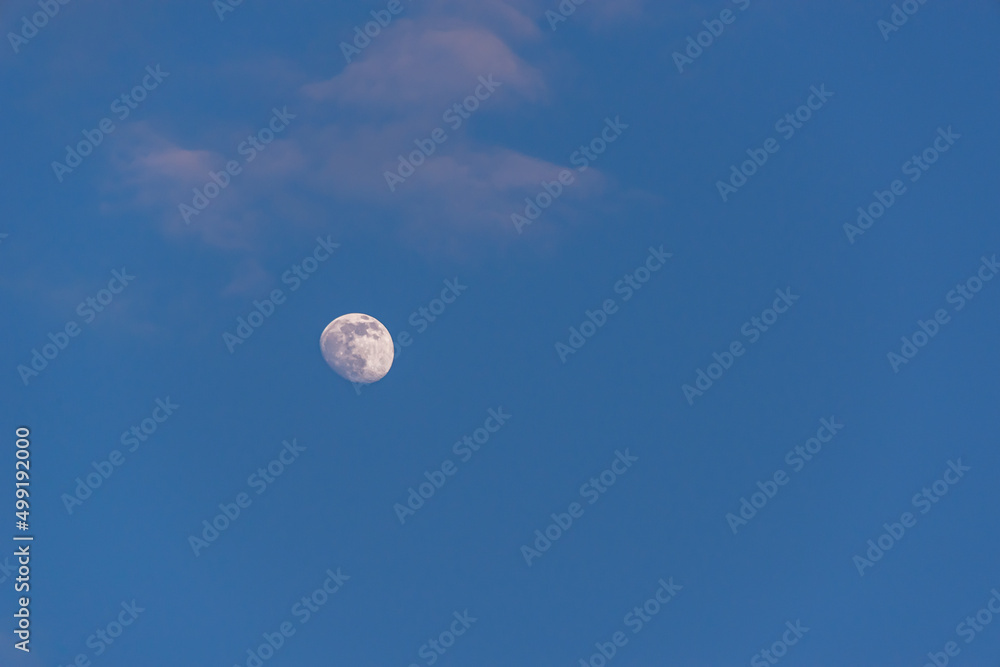 Blue sky and moon with clouds (copy space). Blue sky and moon with clouds (copy space).