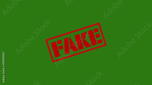 fake Red Stamp Animation On green background.zoom effect photo