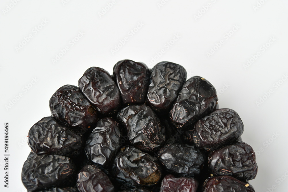 Arabic dates, ajwa dates on the white Stock Photo Adobe Stock