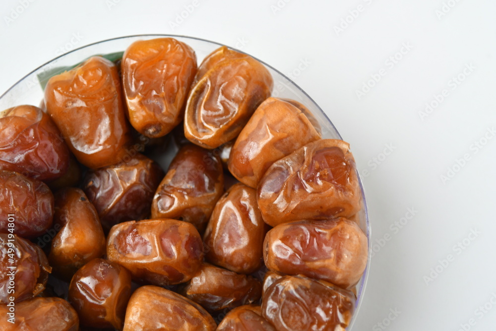 Arabic dates, sugary dates on the white
Arabic dates, sugary dates on the white