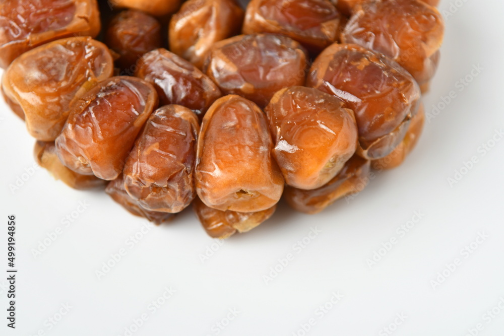 Arabic dates, sugary dates on the white
Arabic dates, sugary dates on the white