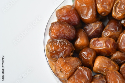 Arabic dates, sugary dates on the white 