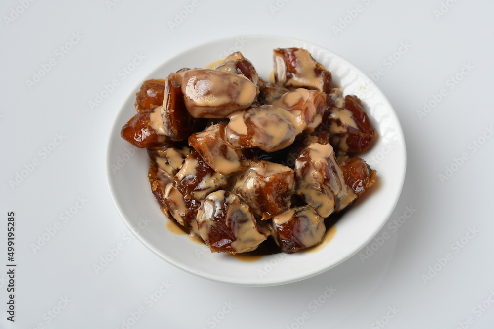 Fresh Arabian dates (Khalas dates ) isolated on white background Fresh Arabian dates (Khalas dates ) isolated on white background