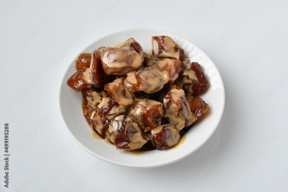 Fresh Arabian dates (Khalas dates ) isolated on white background Fresh Arabian dates (Khalas dates ) isolated on white background