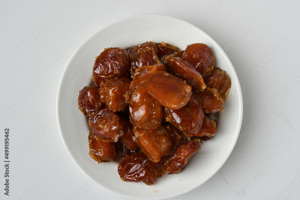 Fresh Arabian dates (Khalas dates ) isolated on white background Fresh Arabian dates (Khalas dates ) isolated on white background