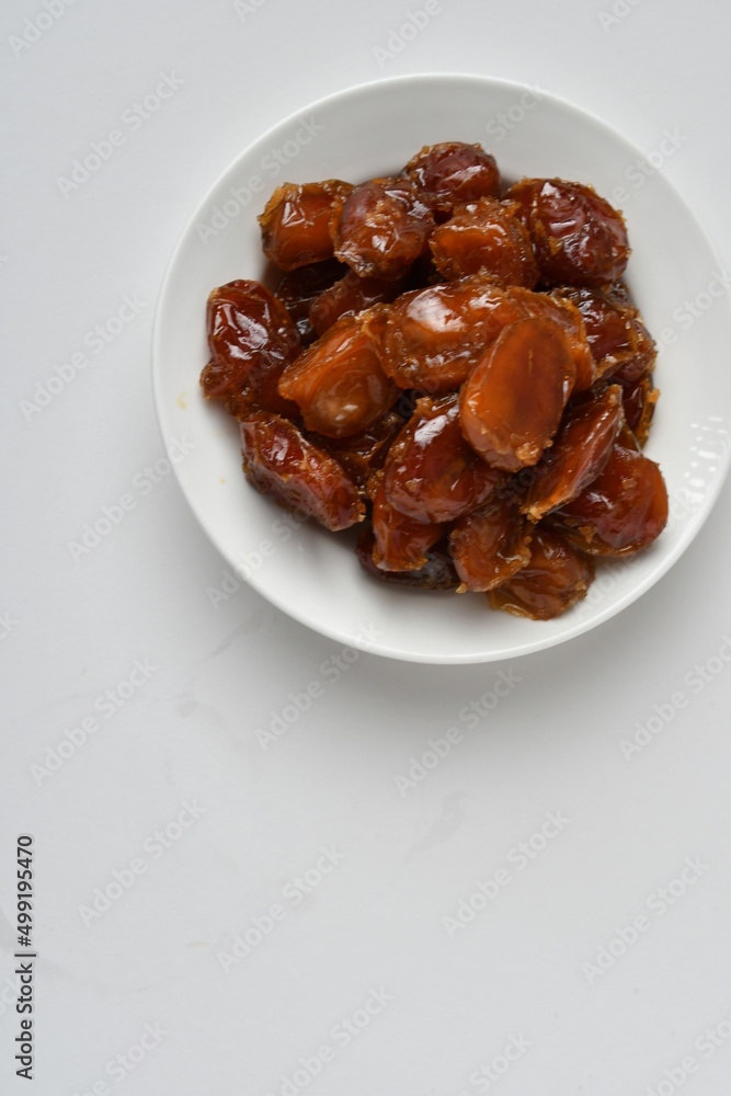 Fresh Arabian dates (Khalas dates ) isolated on white background Fresh Arabian dates (Khalas dates ) isolated on white background