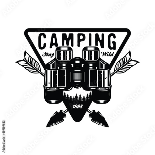 Vintage camping binocular badge design with crossed hunting arrows 