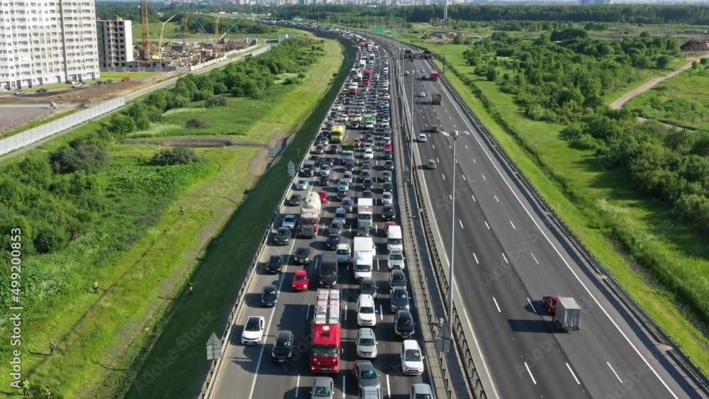 Aerial view of cars on highway, city traffic jam, 4k Aerial view of cars on highway, city traffic jam, 4k
